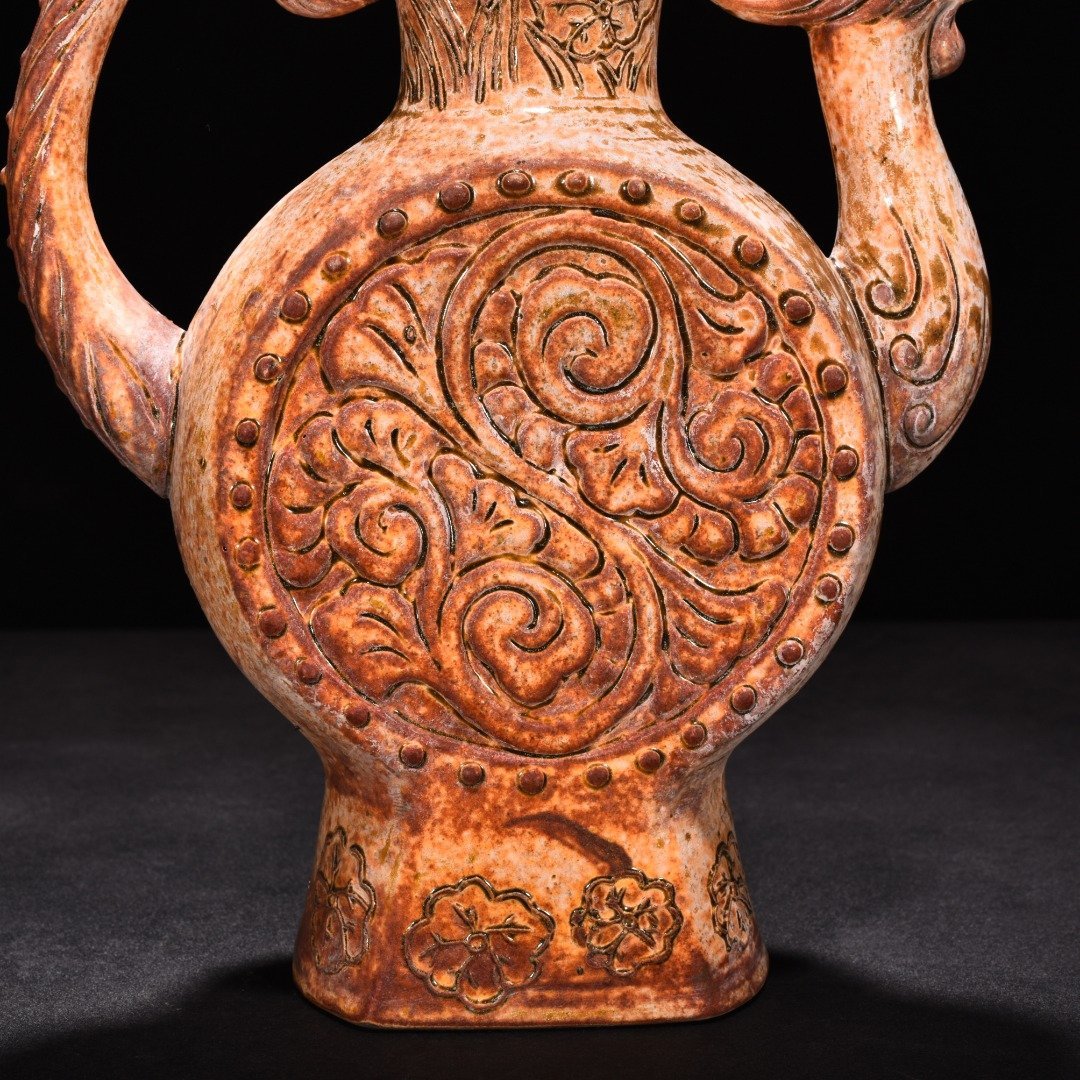 Tang Dynasty yellow glaze phoenix head ewer