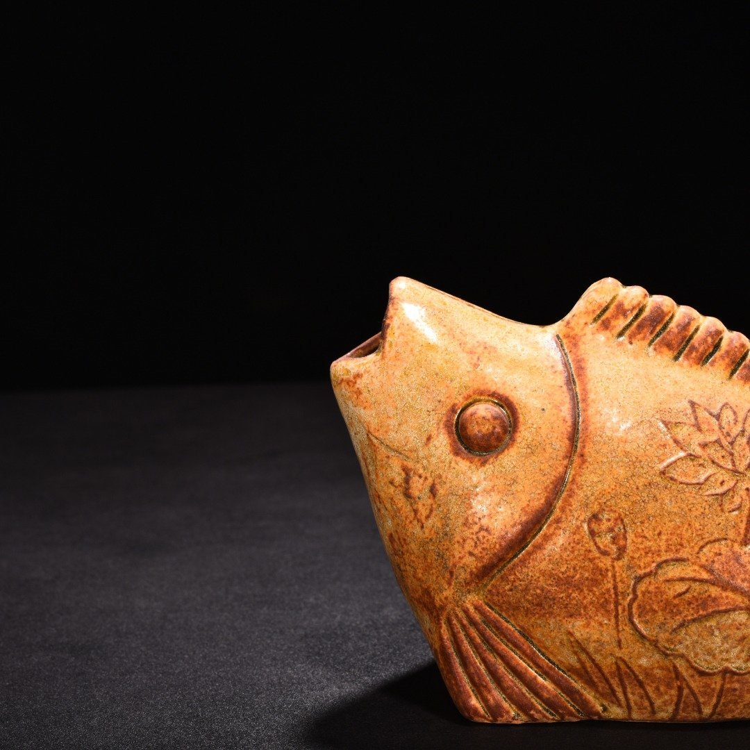 Tang Dynasty yellow glaze fish pot