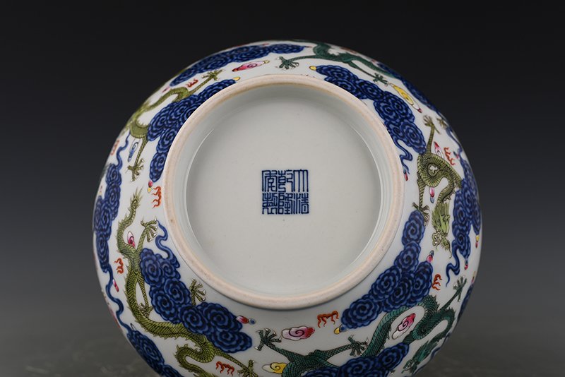 Qing Dynasty Qianlong blue and white pastel cloud and dragon pattern double-eared dish-mouth bottle