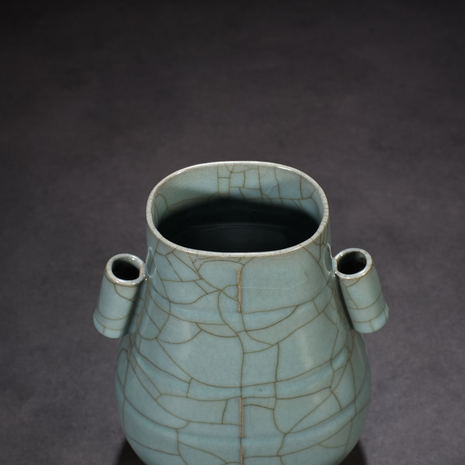 Song Dynasty Xiuneisi official kiln celadon-glazed through-ear vase