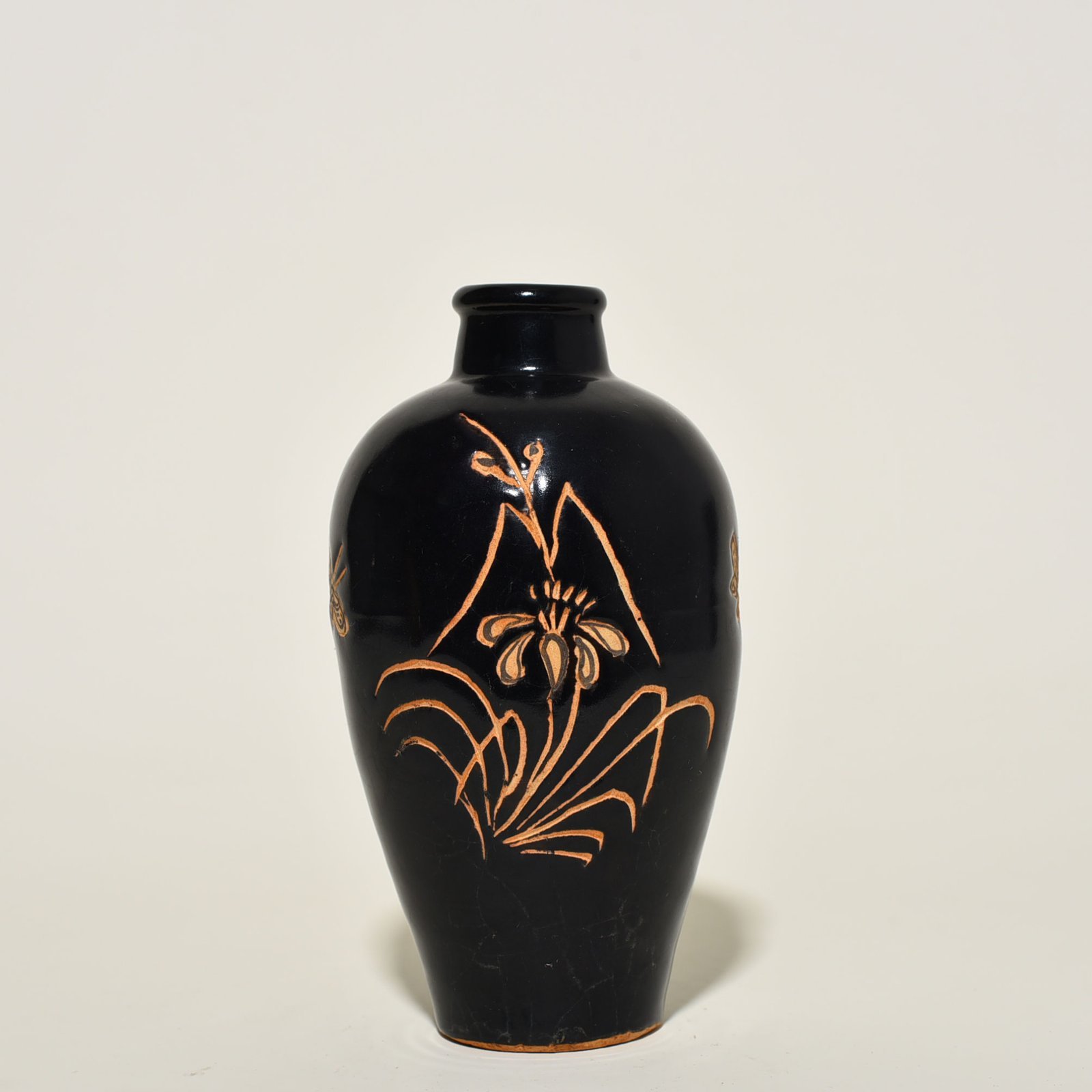 Song Dynasty Jizhou kiln carved orchid plum vase