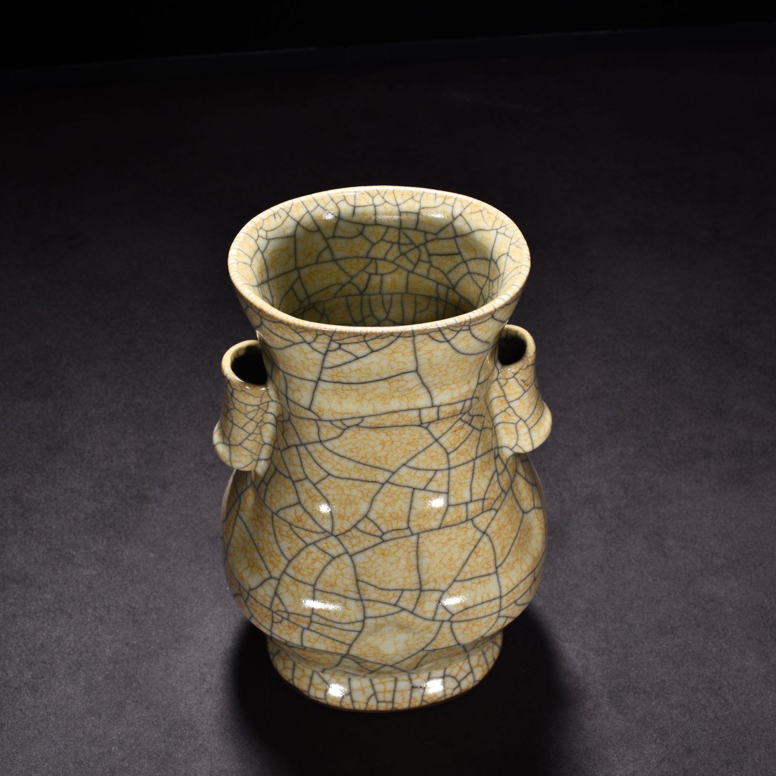 Song Dynasty Ge kiln beige glaze through-ear vase