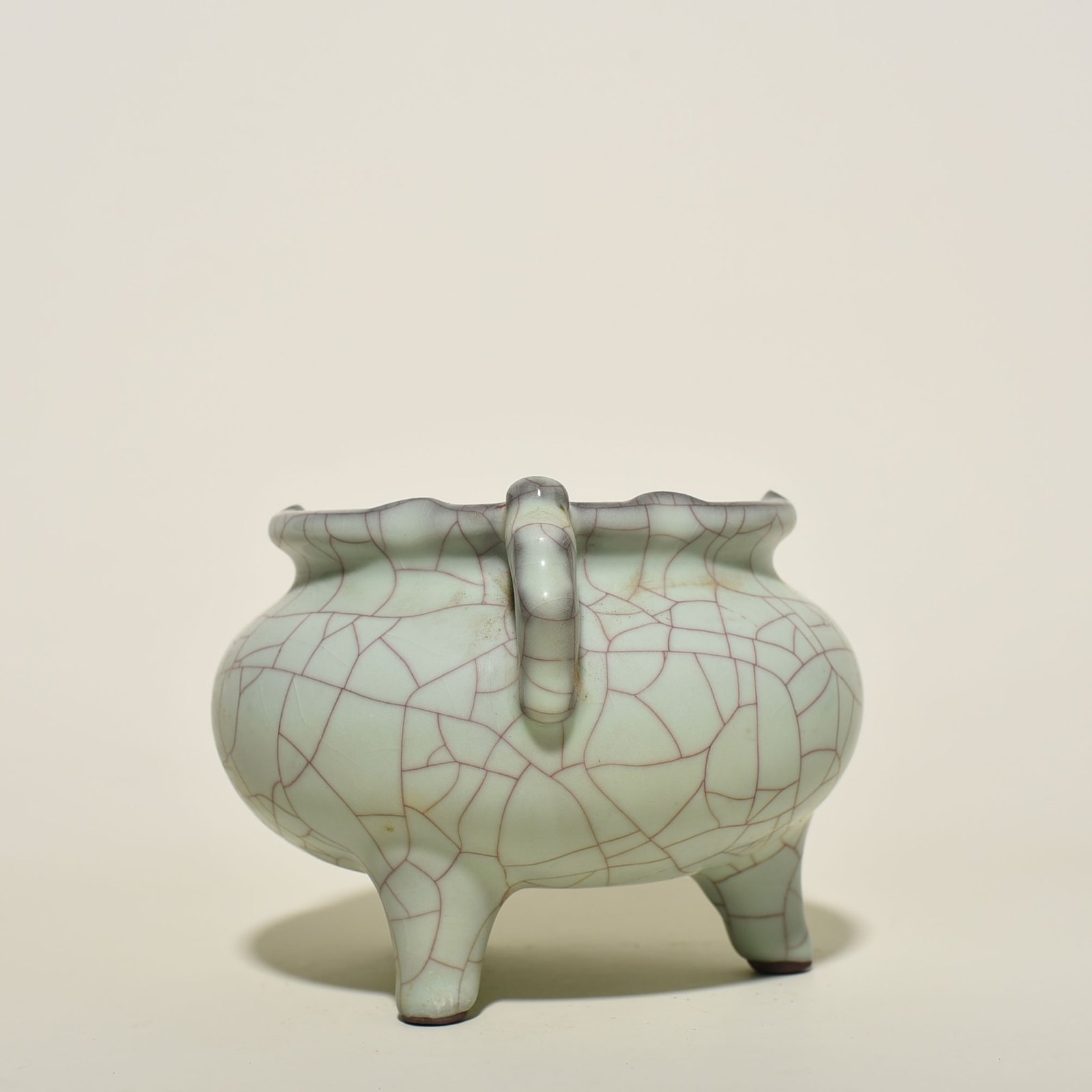 Song Dynasty official kiln moon white glaze three-legged furnace