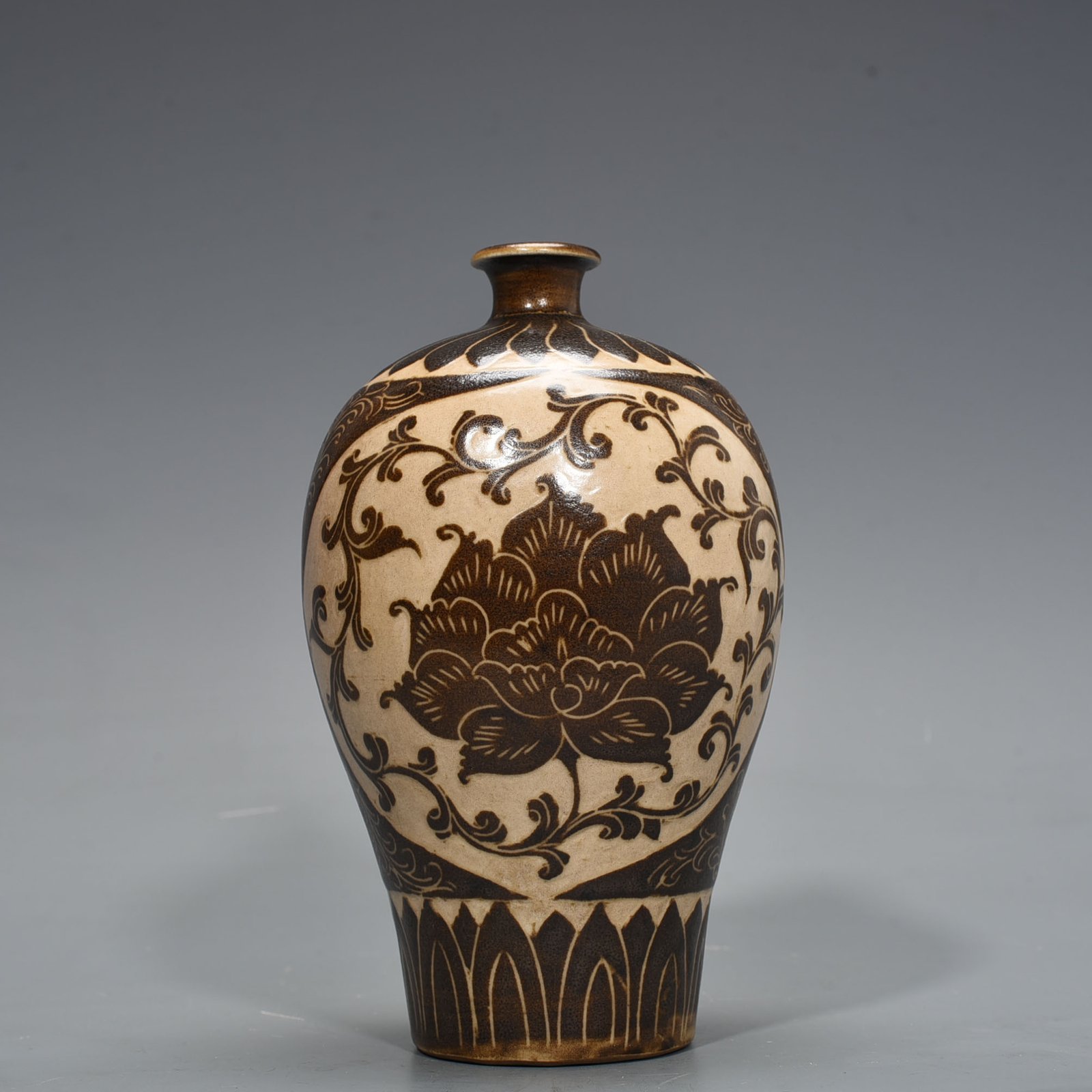 Song Dynasty Ding Kiln East Palace Model brown color engraved plum vase