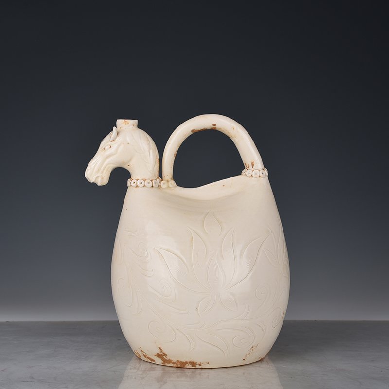 Song Dynasty Ding kiln carved imitation leather bag