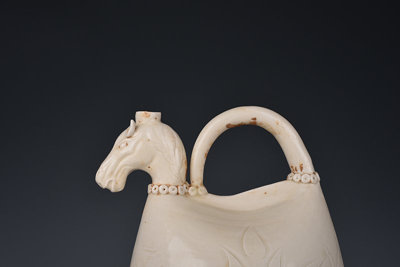 Song Dynasty Ding kiln carved imitation leather bag