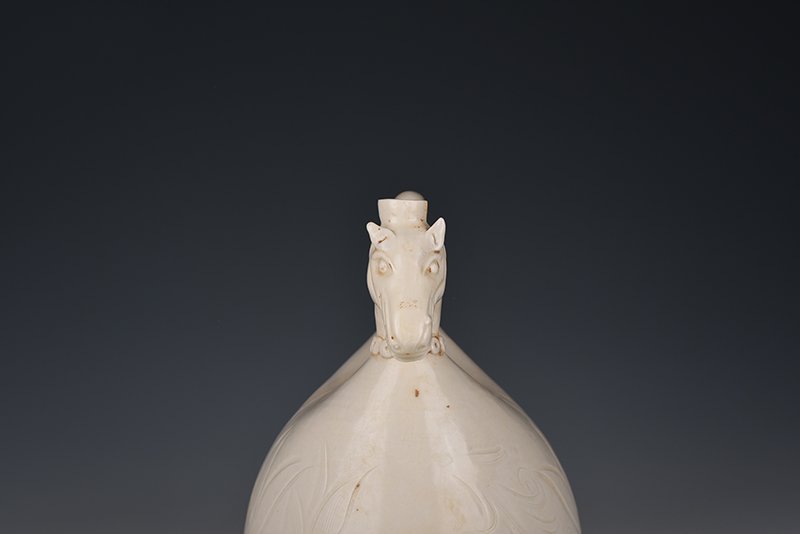 Song Dynasty Ding kiln carved imitation leather bag
