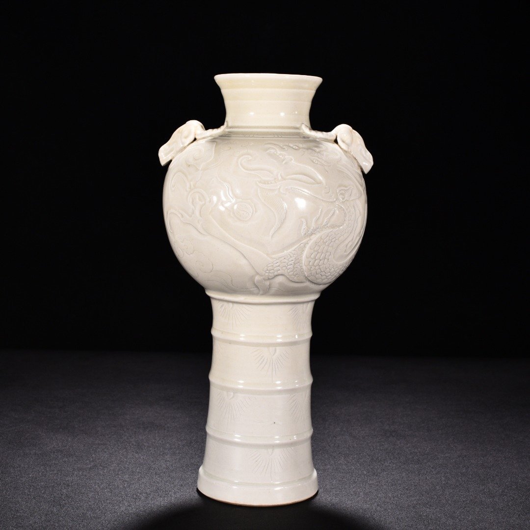 Song Dynasty Ding kiln carved dragon pattern sheep head statue