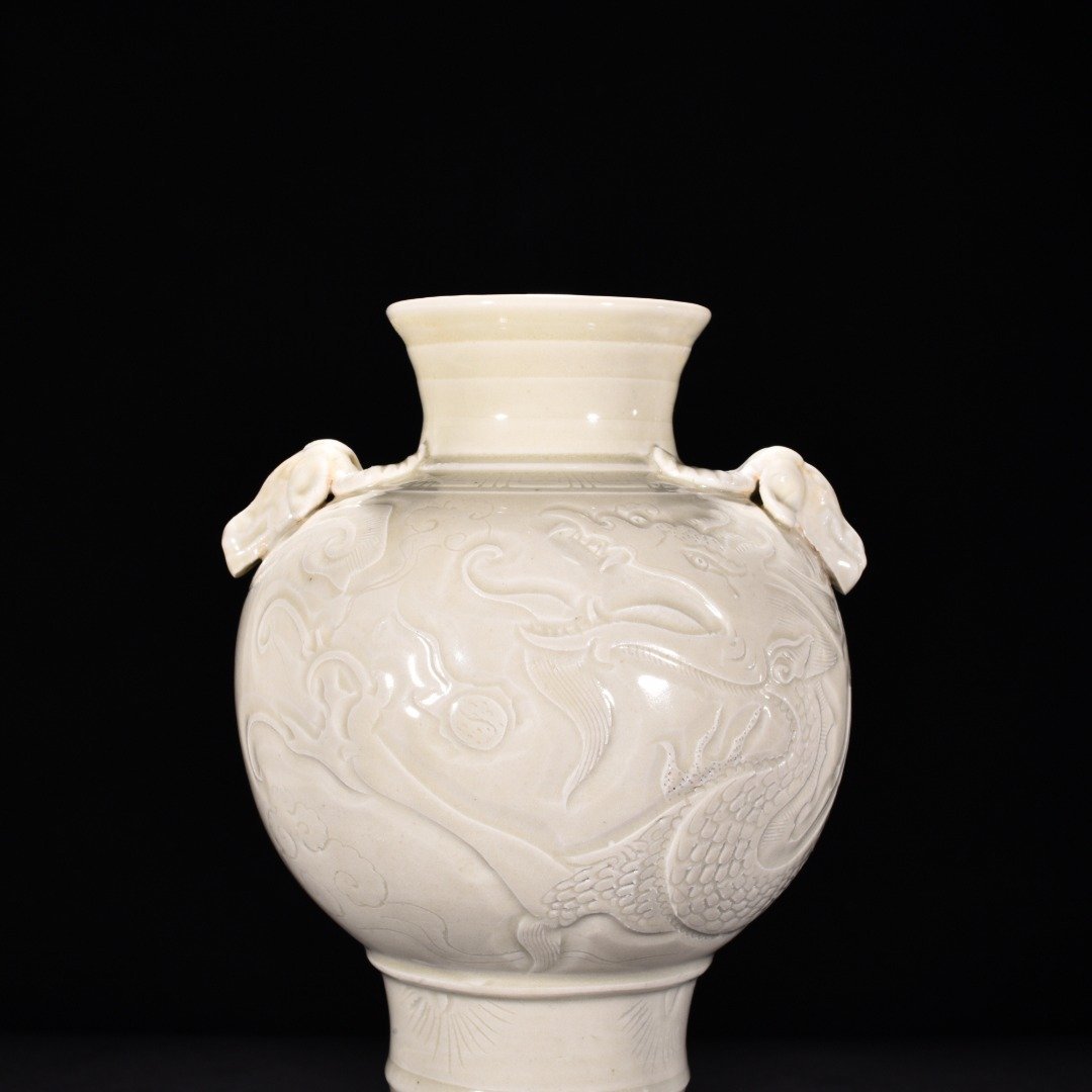 Song Dynasty Ding kiln carved dragon pattern sheep head statue