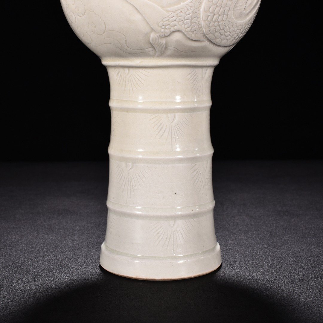 Song Dynasty Ding kiln carved dragon pattern sheep head statue