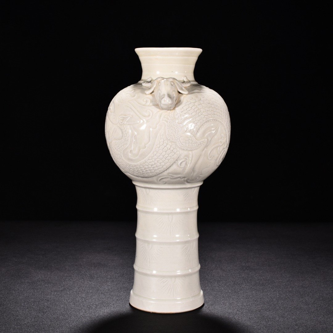 Song Dynasty Ding kiln carved dragon pattern sheep head statue