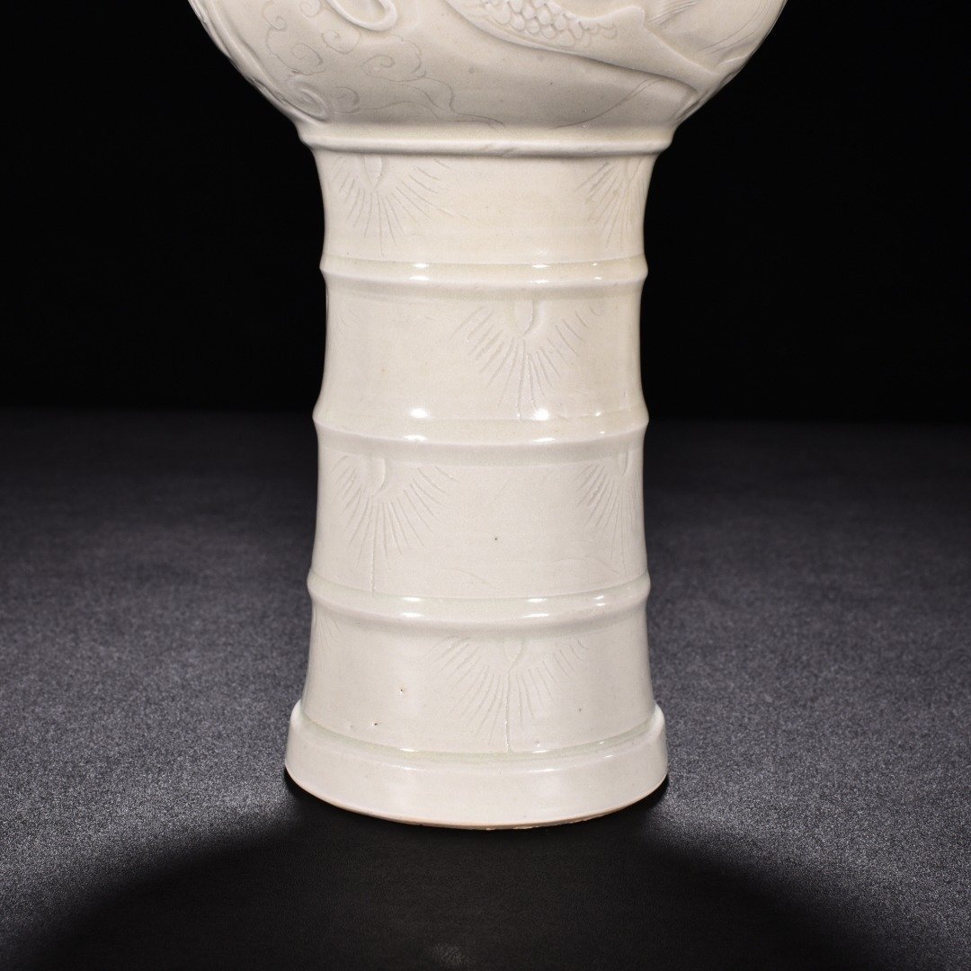Song Dynasty Ding kiln carved dragon pattern sheep head statue