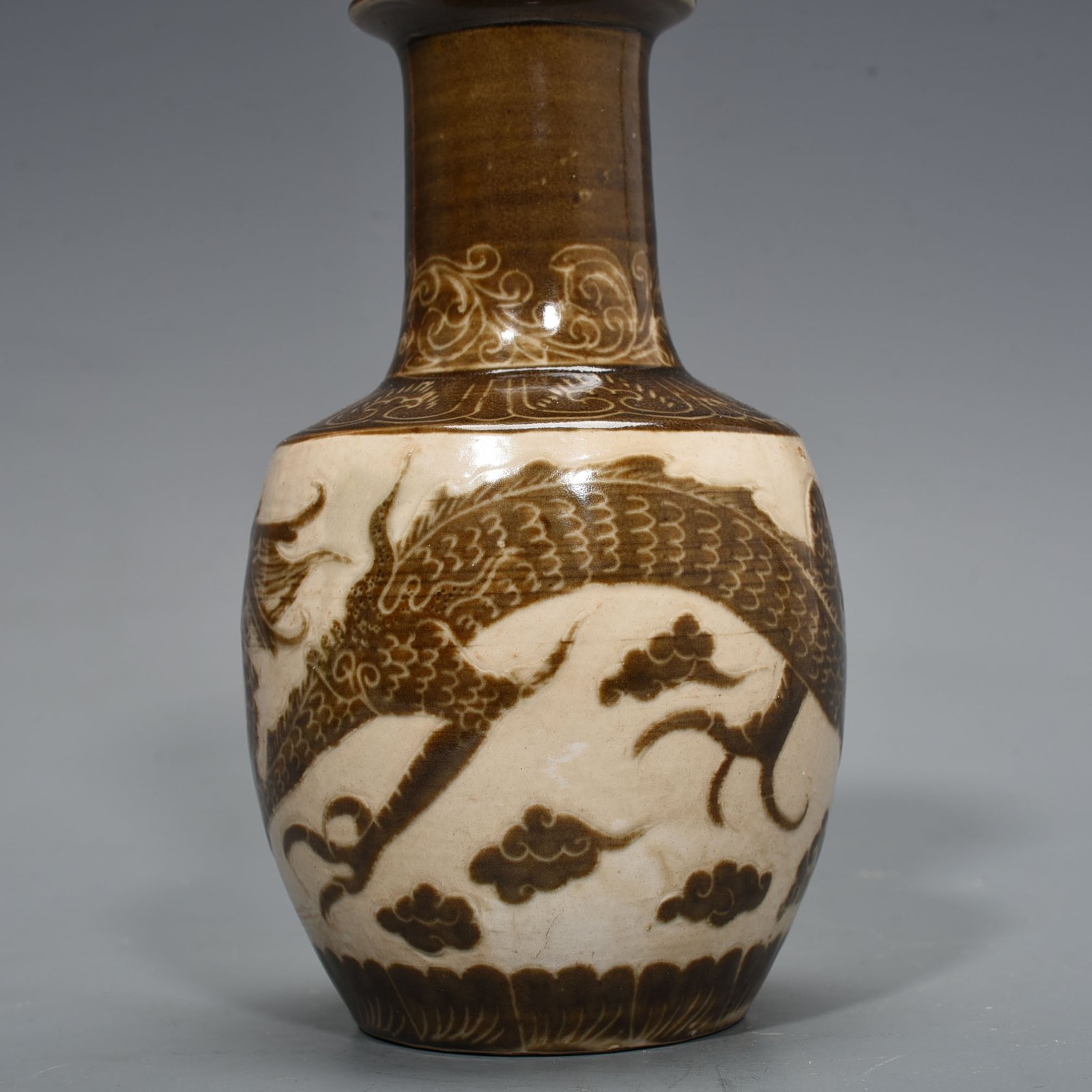 Song Dynasty Ding kiln Shang Shi Bureau model brown color engraved bottle