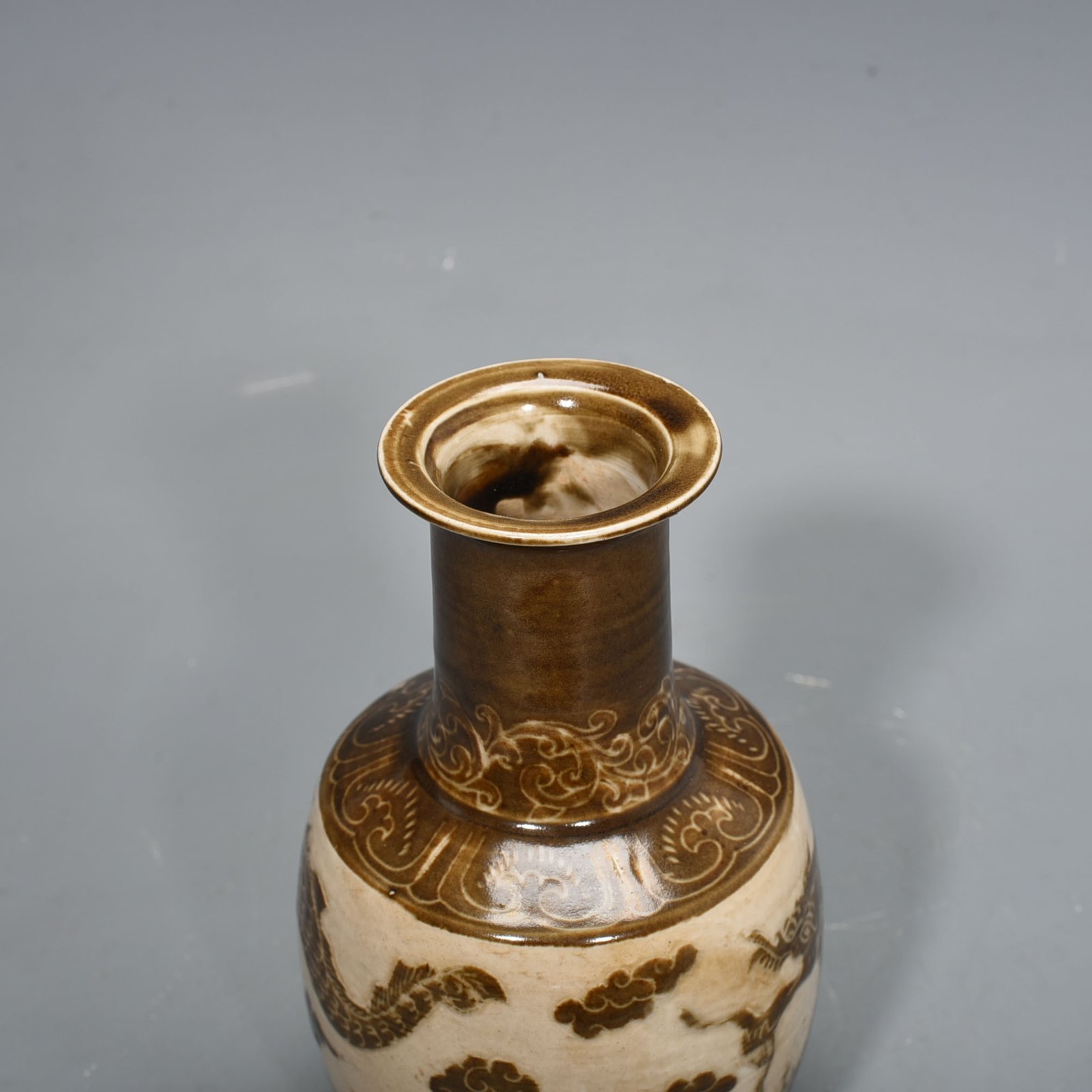 Song Dynasty Ding kiln Shang Shi Bureau model brown color engraved bottle