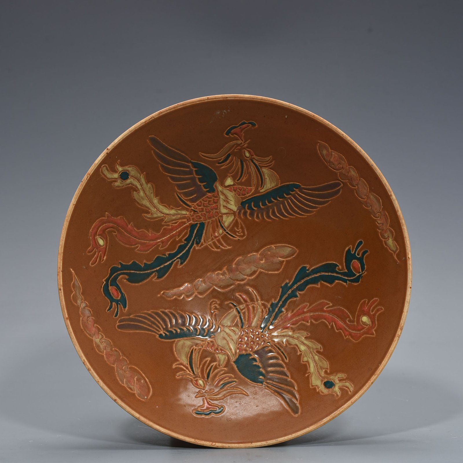 Song Dynasty Ding kiln purple Ding phoenix pattern bowl