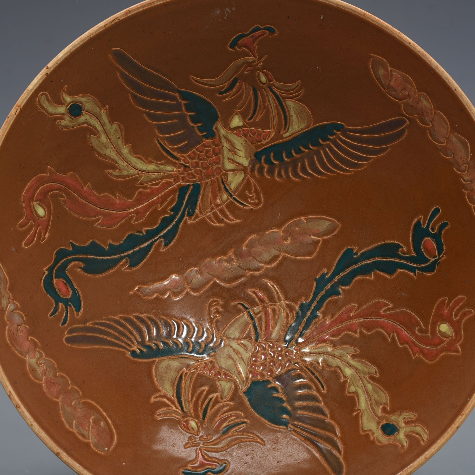 Song Dynasty Ding kiln purple Ding phoenix pattern bowl