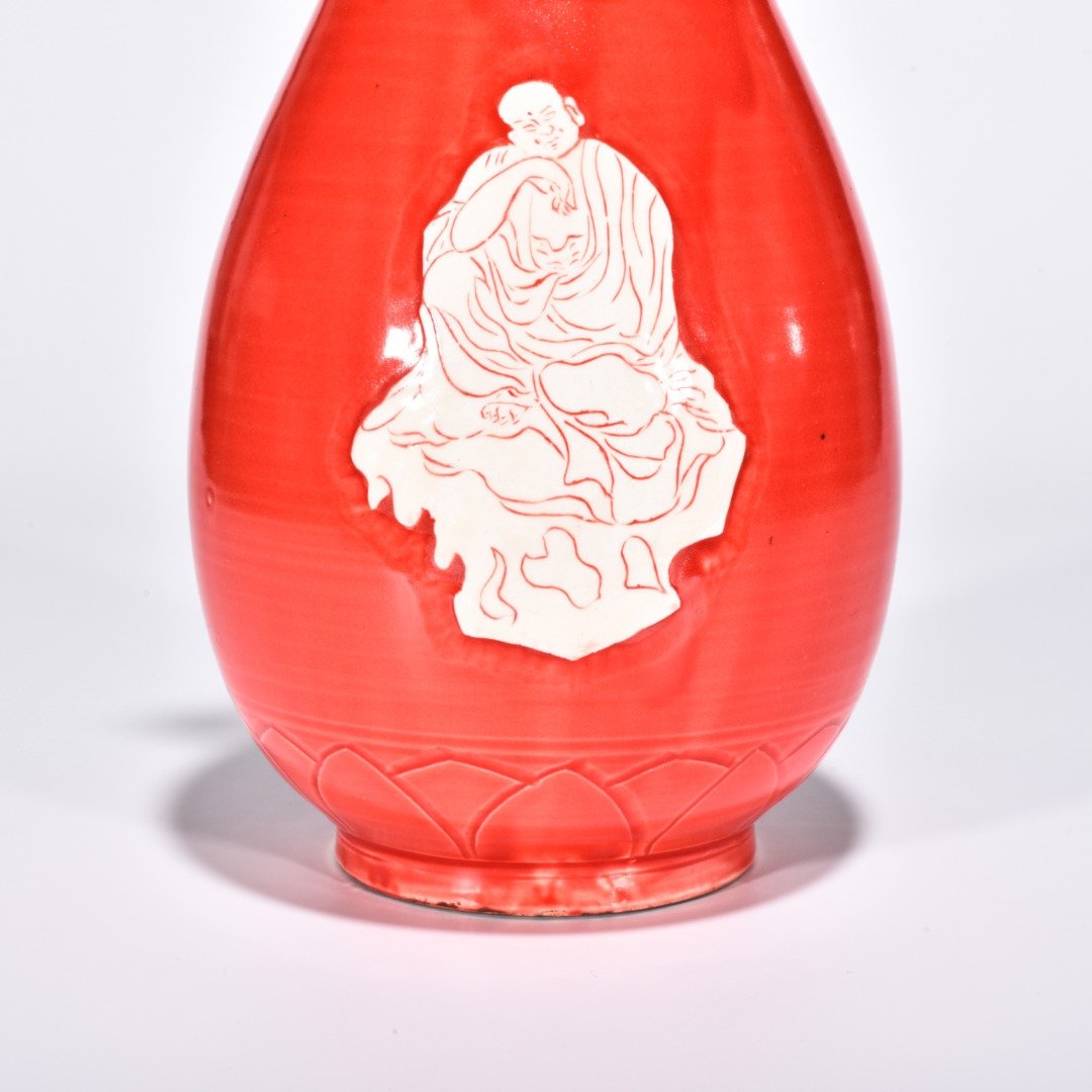 Song Dynasty Ding kiln red glaze engraved Arhat amphorae