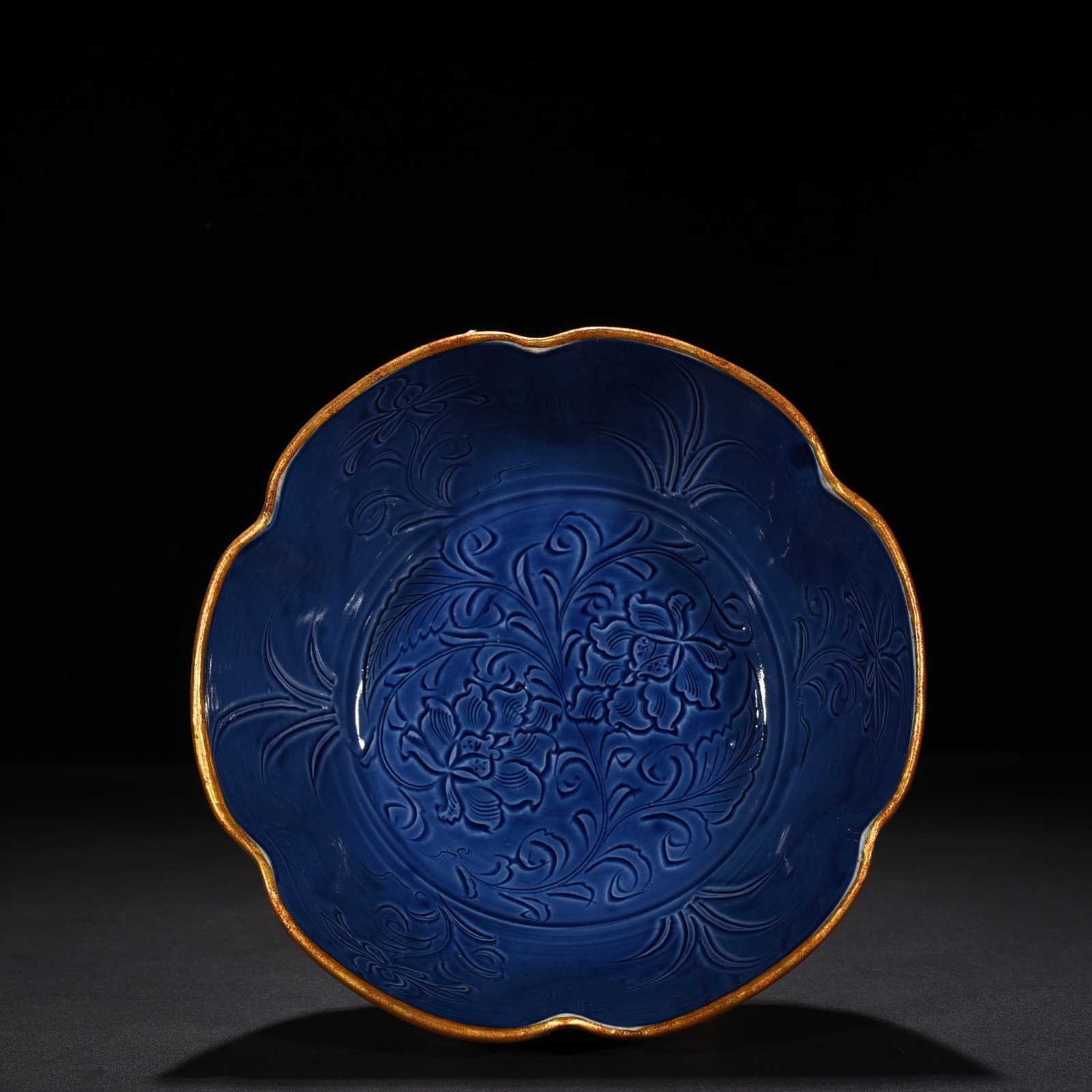 Song Dynasty Ding Kiln blue glaze engraved flower pattern sunflower mouth bowl