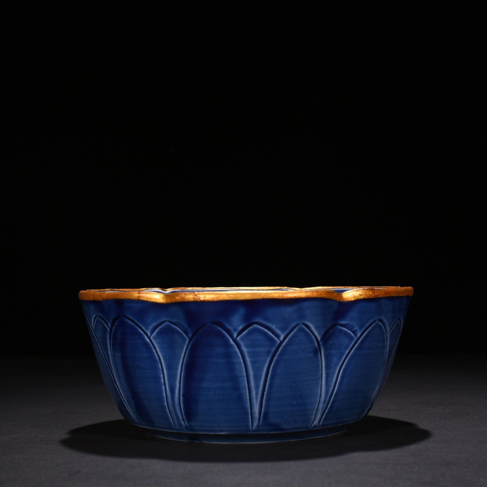 Song Dynasty Ding Kiln blue glaze engraved flower pattern sunflower mouth bowl