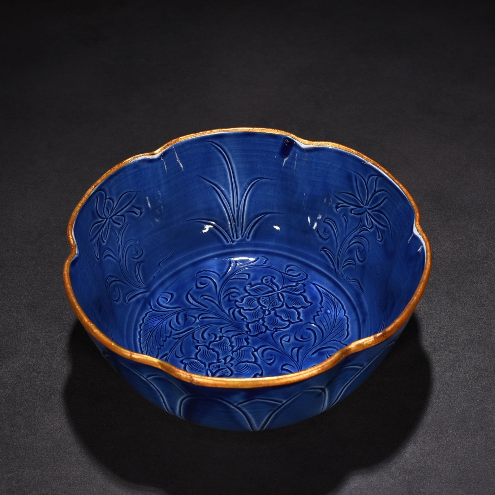 Song Dynasty Ding Kiln blue glaze engraved flower pattern sunflower mouth bowl