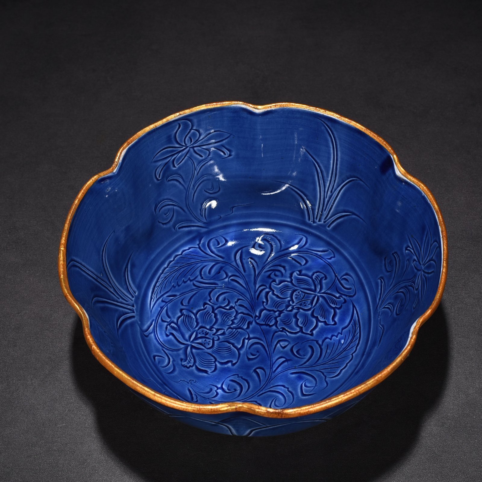 Song Dynasty Ding Kiln blue glaze engraved flower pattern sunflower mouth bowl