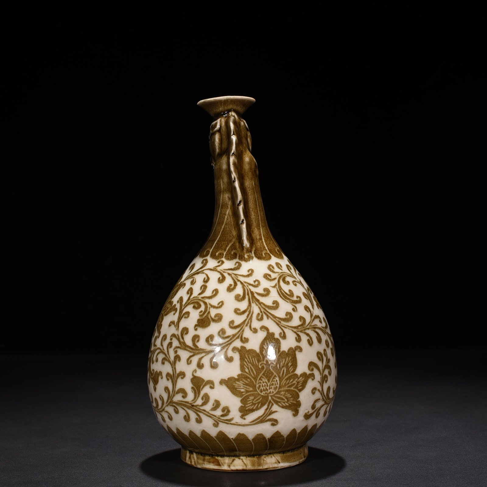 Song Dynasty Ding kiln brown color carved horse head pot