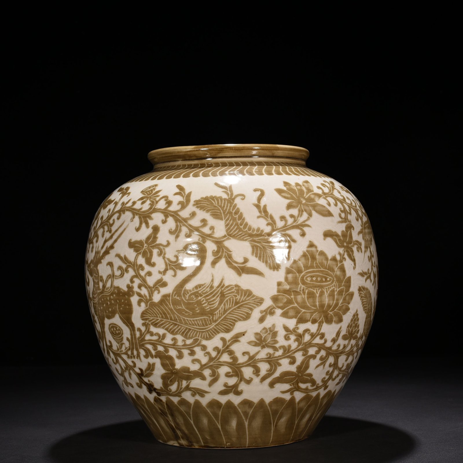 Song Dynasty Ding kiln brown color engraved jar with deer and crane pattern