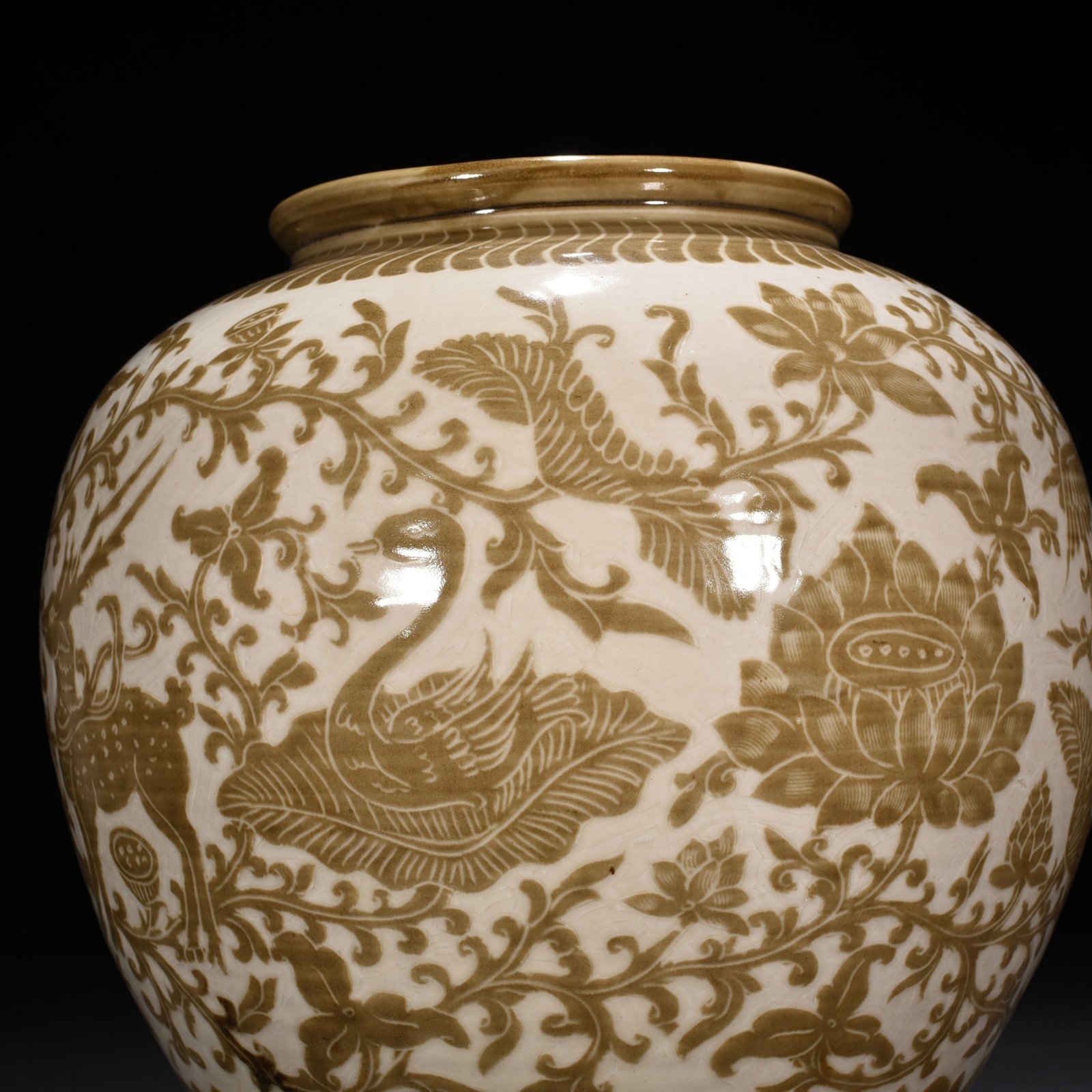 Song Dynasty Ding kiln brown color engraved jar with deer and crane pattern