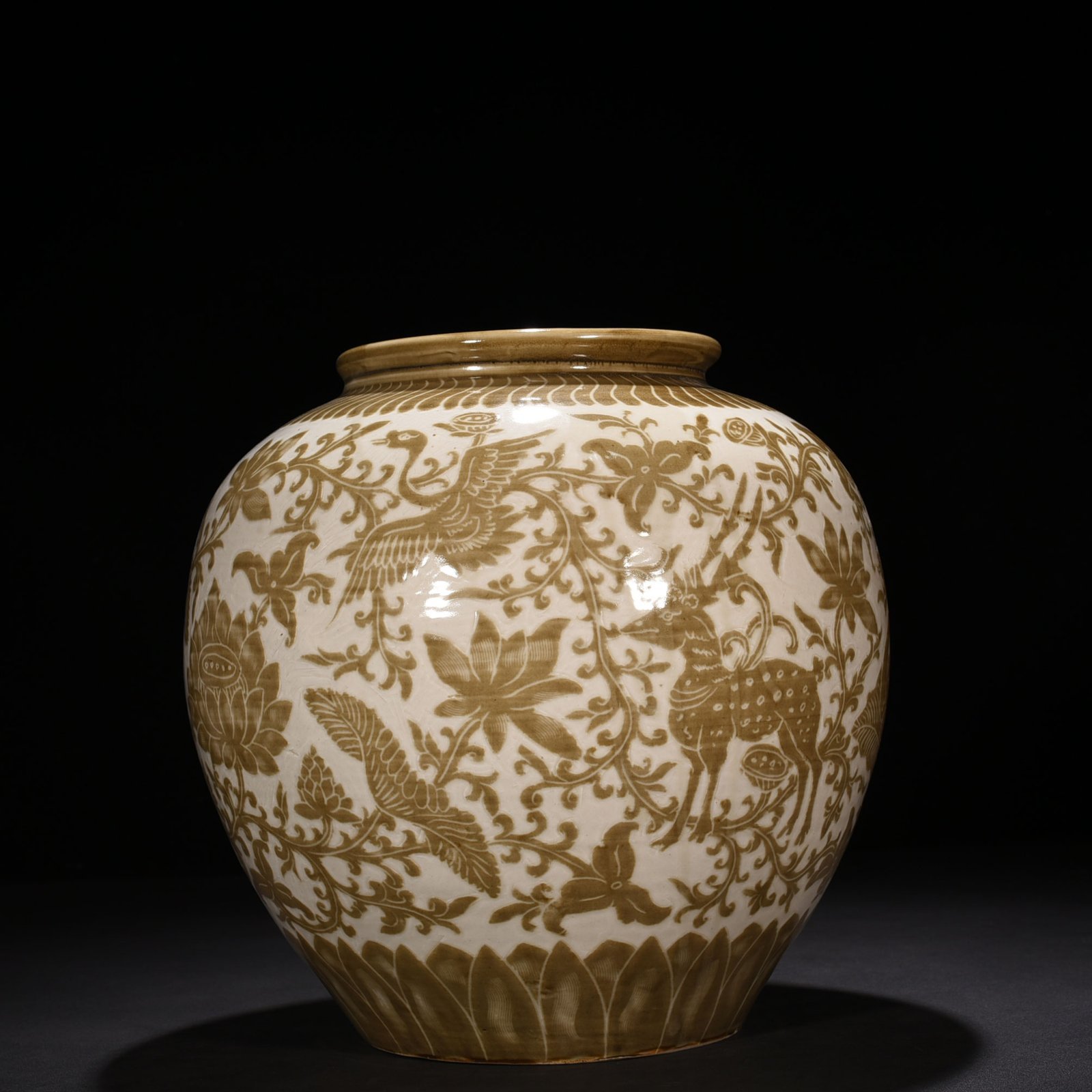 Song Dynasty Ding kiln brown color engraved jar with deer and crane pattern