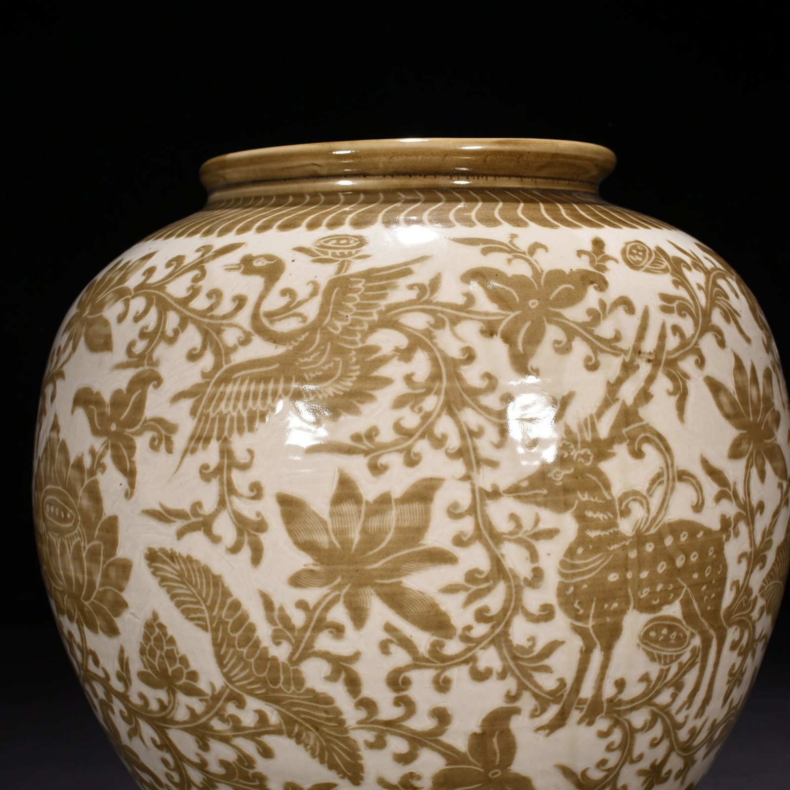 Song Dynasty Ding kiln brown color engraved jar with deer and crane pattern
