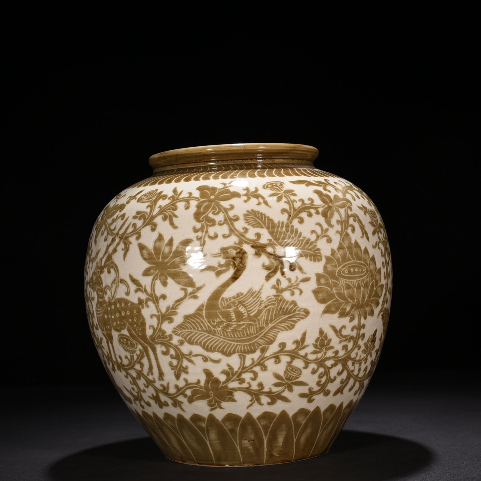 Song Dynasty Ding kiln brown color engraved jar with deer and crane pattern