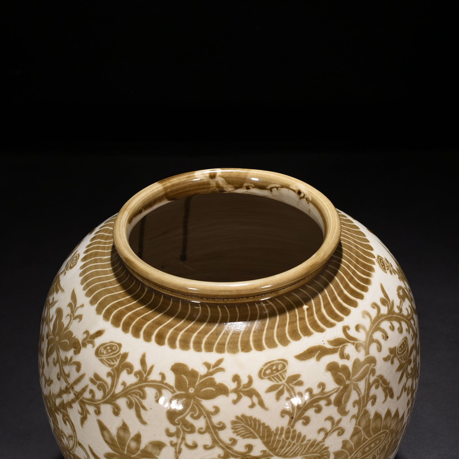 Song Dynasty Ding kiln brown color engraved jar with deer and crane pattern