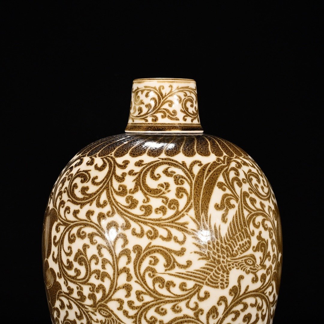 Song Dynasty Ding kiln brown color flower and phoenix pattern plum vase