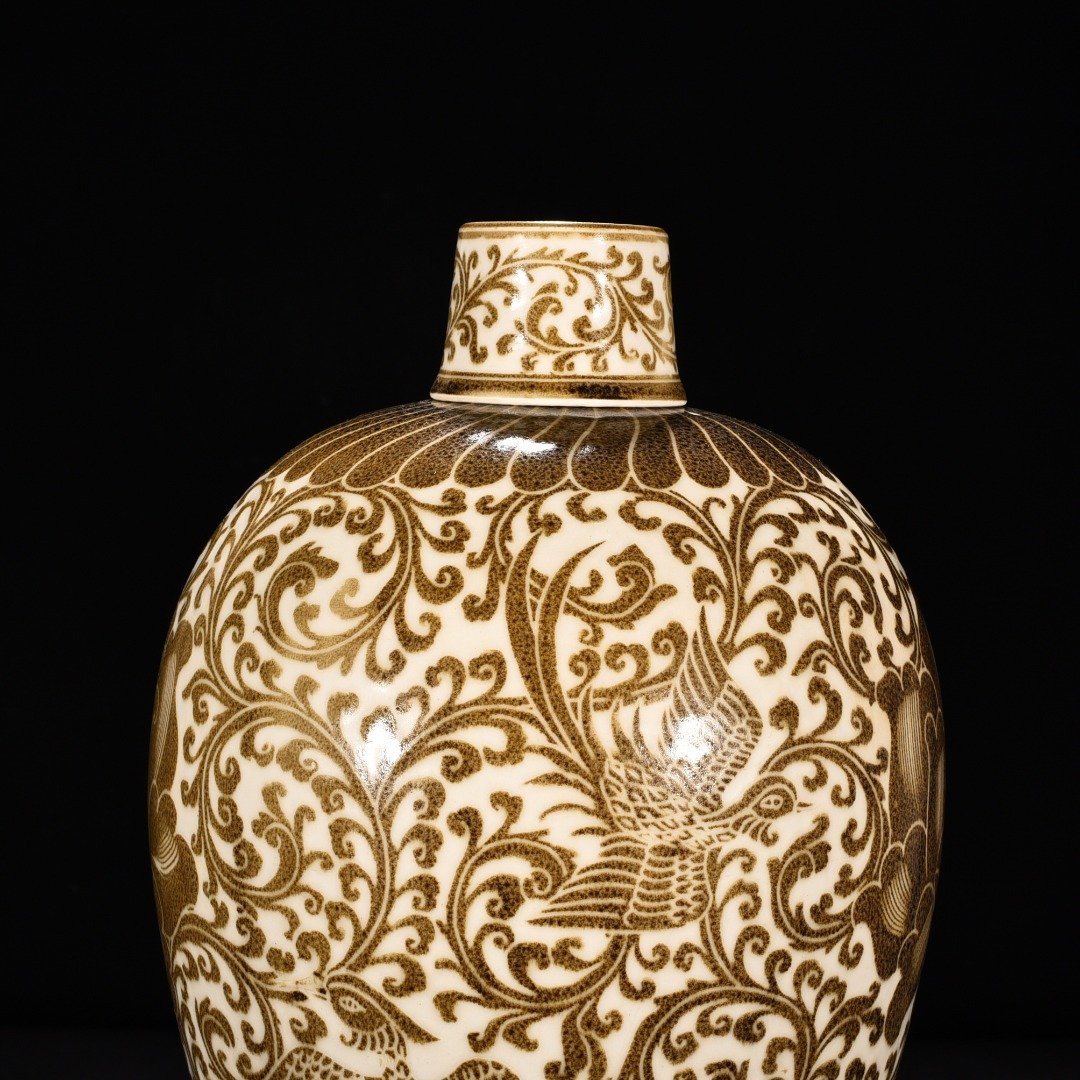 Song Dynasty Ding kiln brown color flower and phoenix pattern plum vase