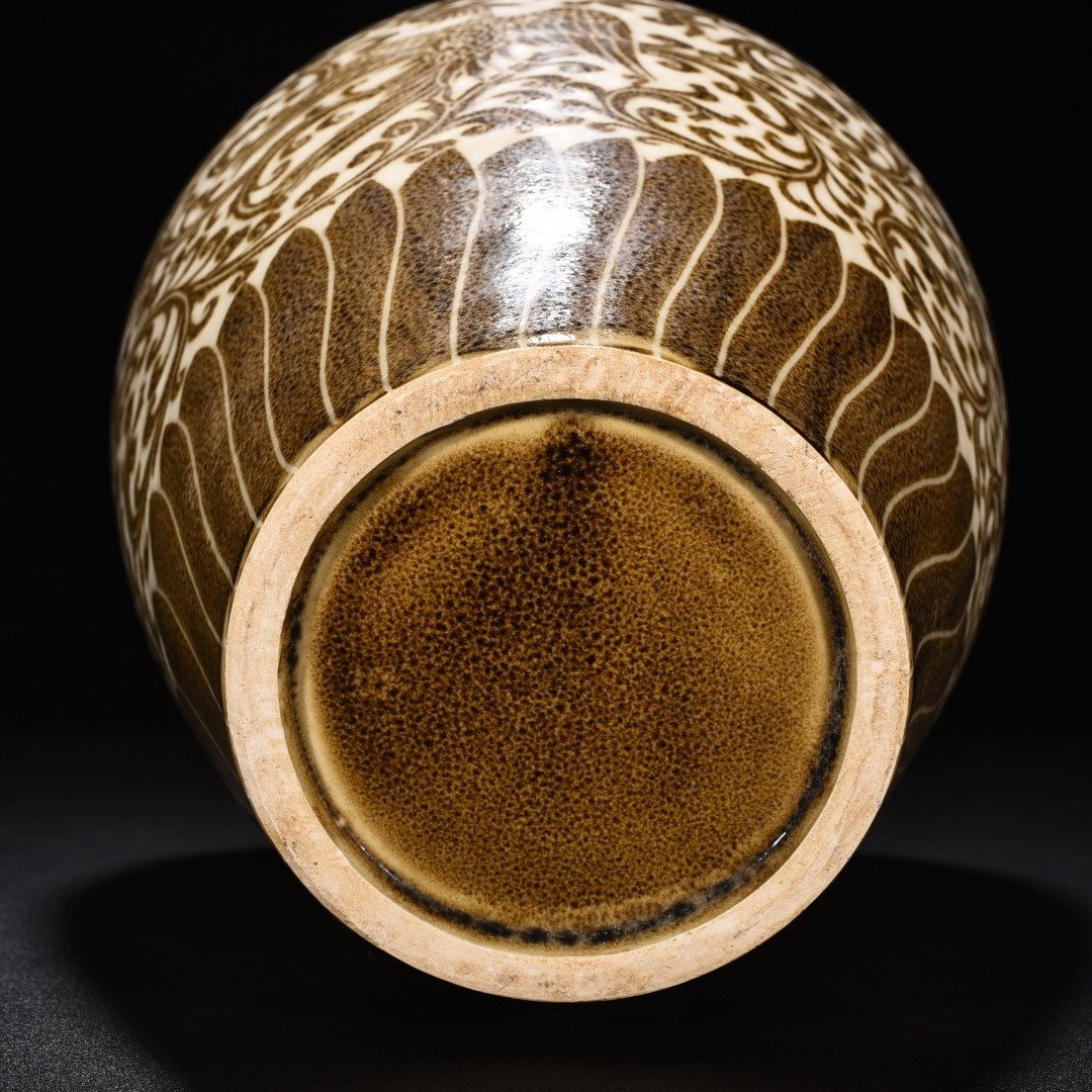Song Dynasty Ding kiln brown color flower and phoenix pattern plum vase
