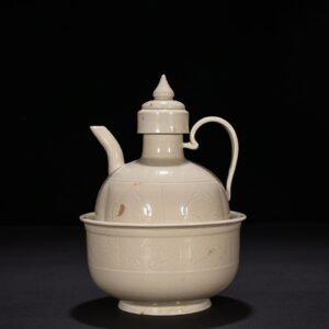 Song Dynasty Ding kiln carved flower pattern wine jug