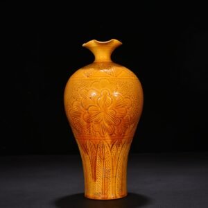 Song Dynasty Ding kiln yellow glaze engraved flower pattern plum vase