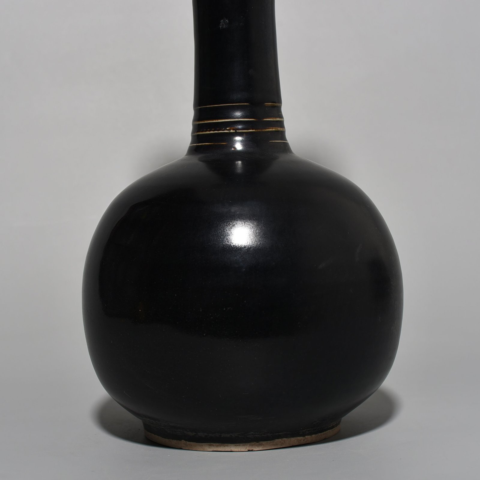 Song Dynasty Ding kiln black glaze through-ear vase