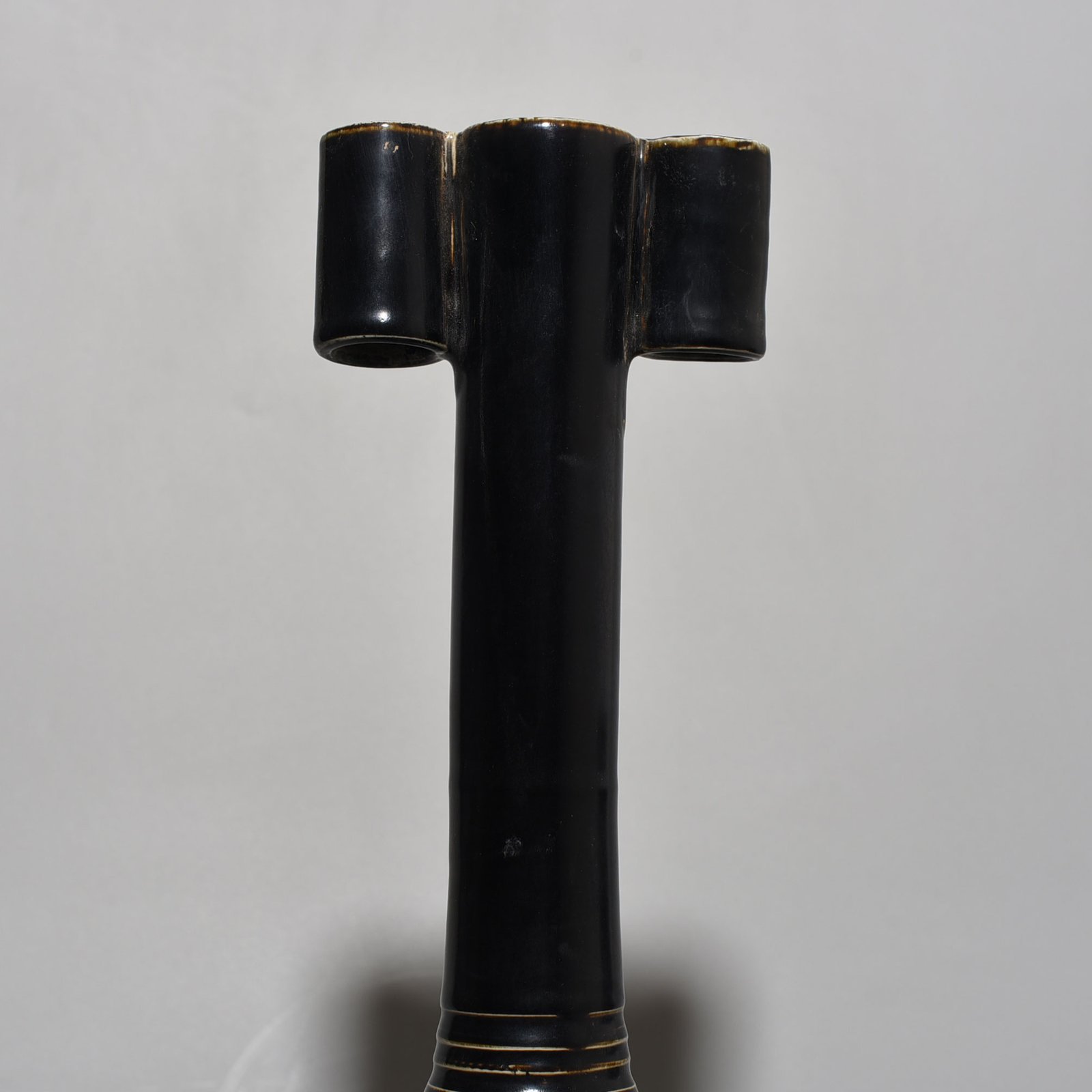 Song Dynasty Ding kiln black glaze through-ear vase