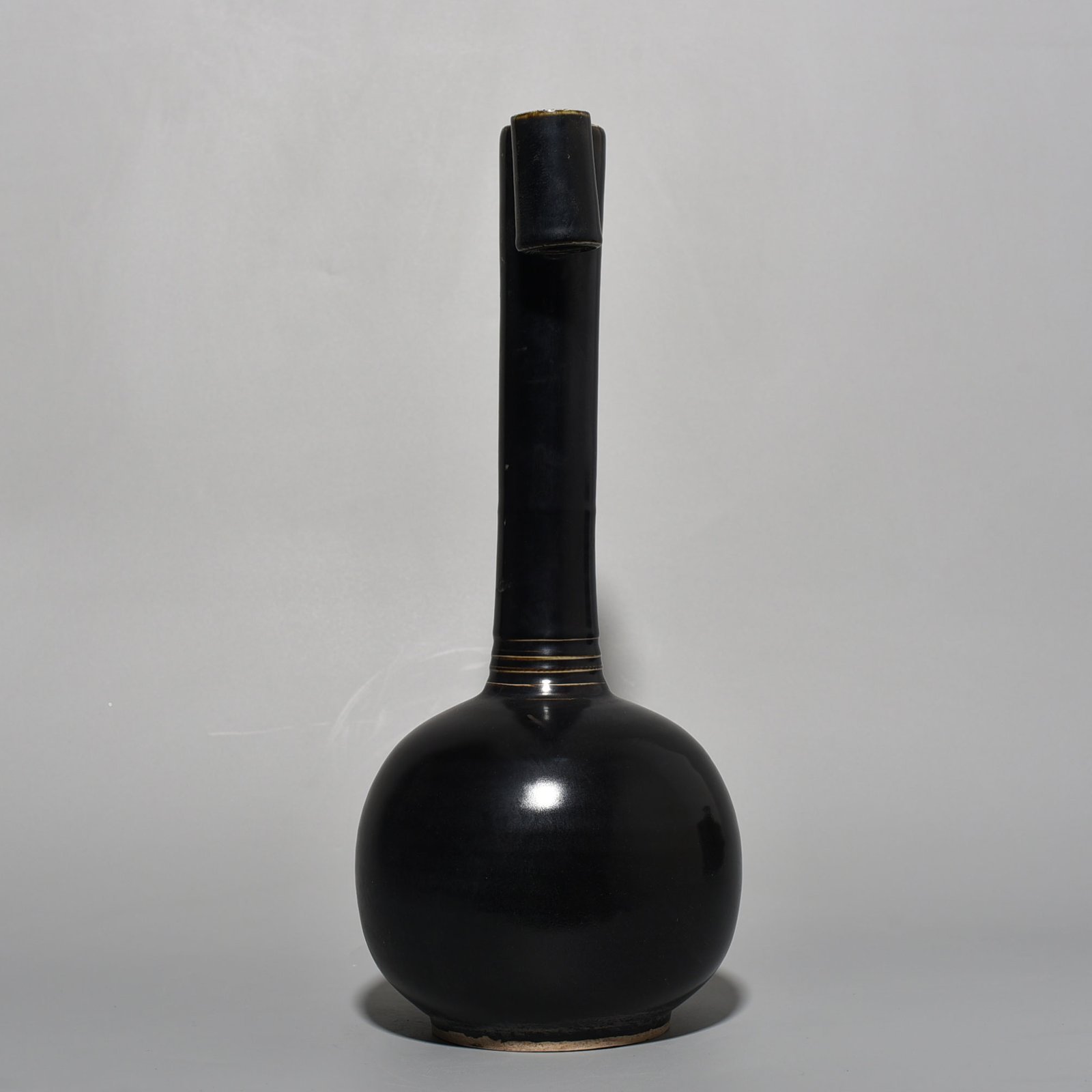 Song Dynasty Ding kiln black glaze through-ear vase