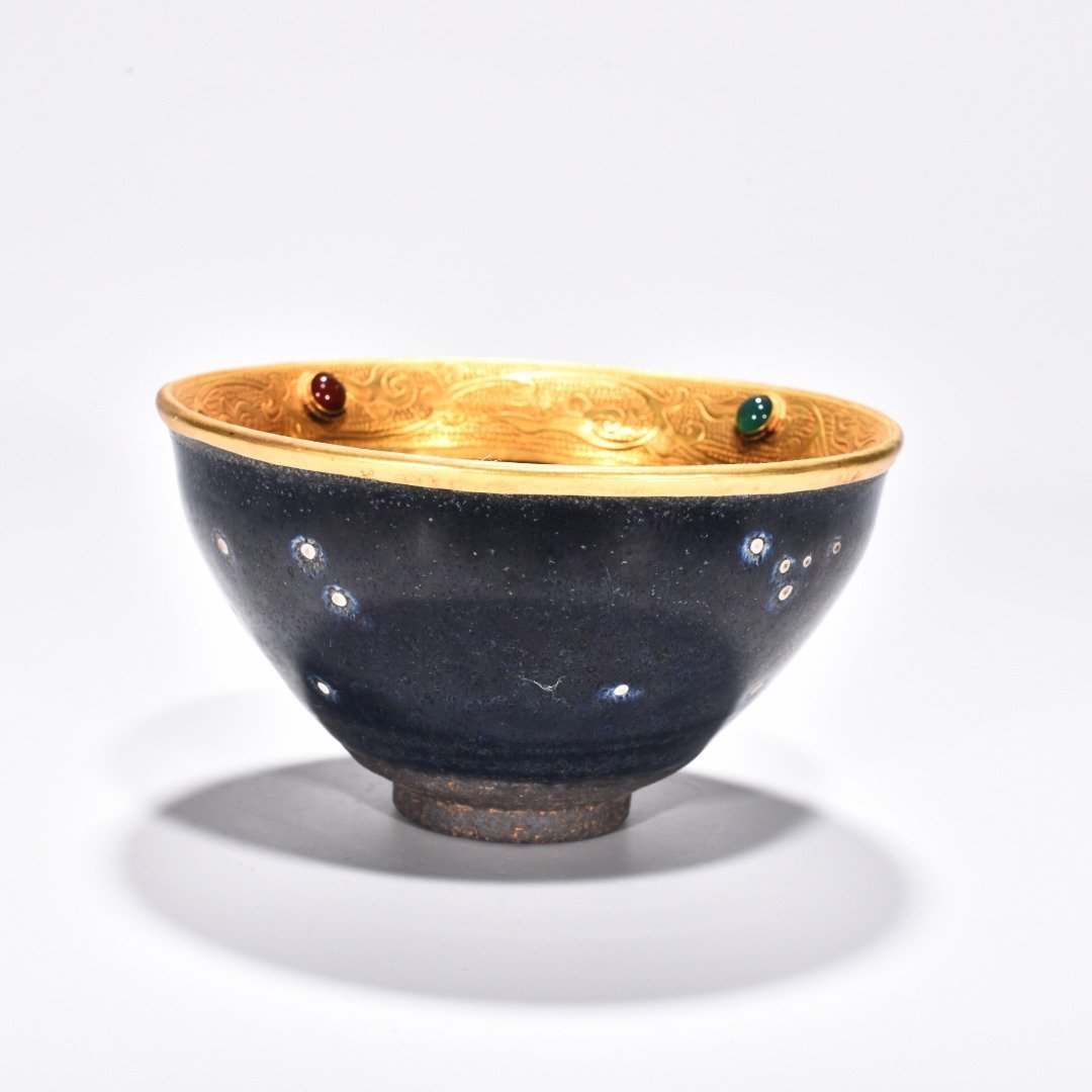 Song Dynasty Jianyao luminous celestial eye lamp engraved gilt and inlaid with gems