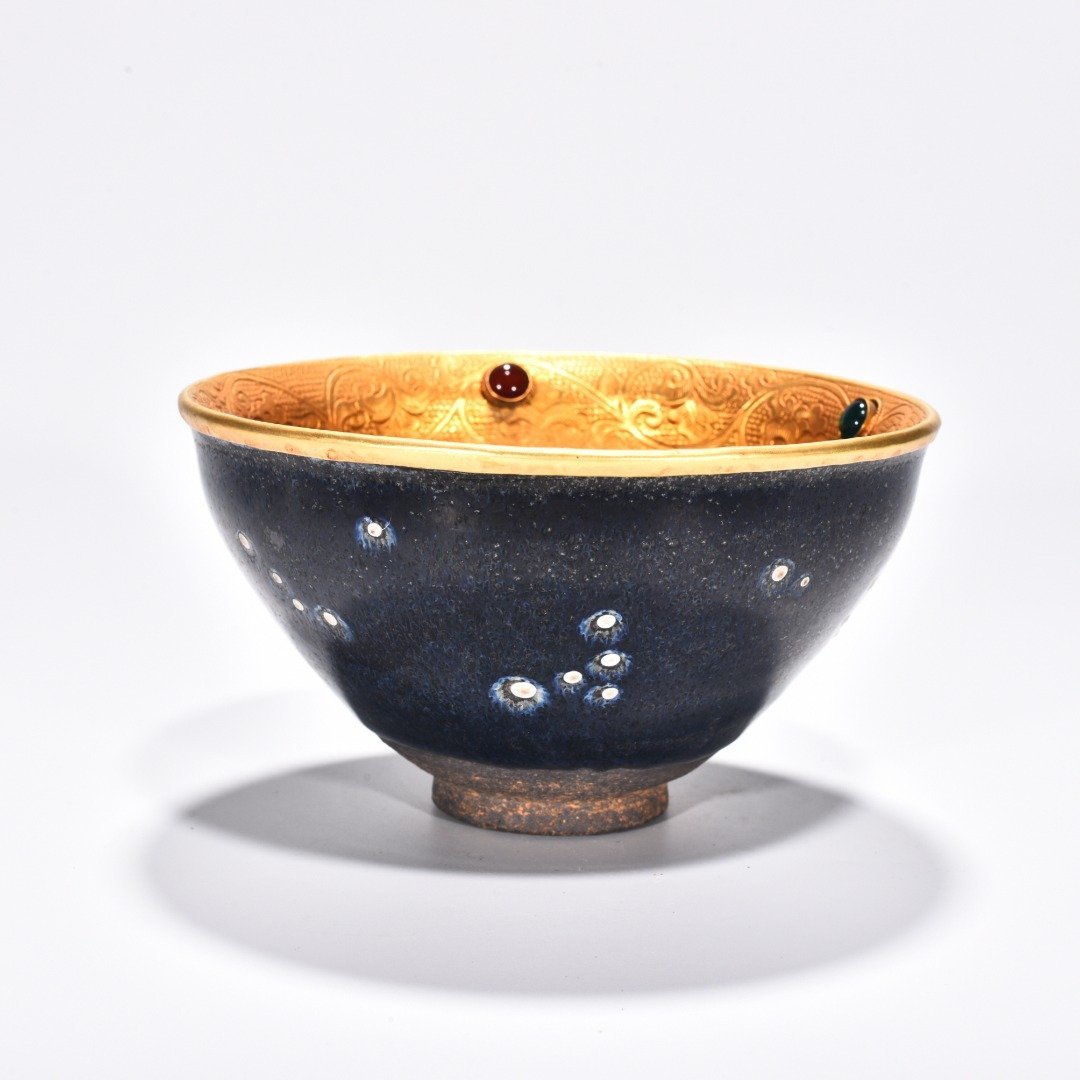 Song Dynasty Jianyao luminous celestial eye lamp engraved gilt and inlaid with gems