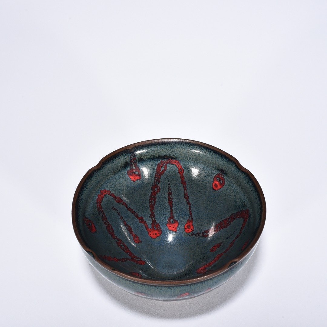 Song Dynasty Jianyao blue glaze spotted flower mouth lamp