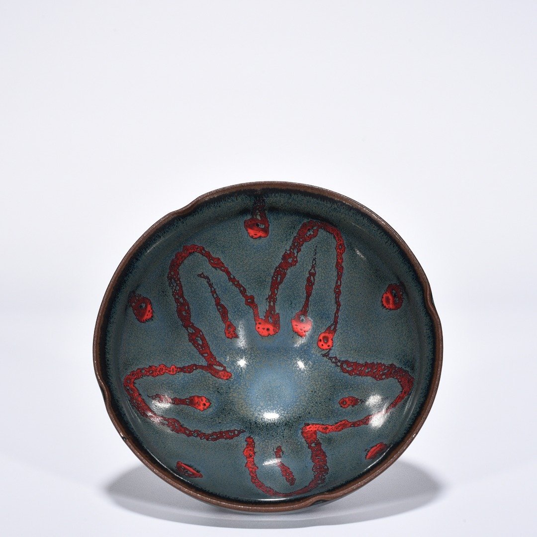 Song Dynasty Jianyao blue glaze spotted flower mouth lamp