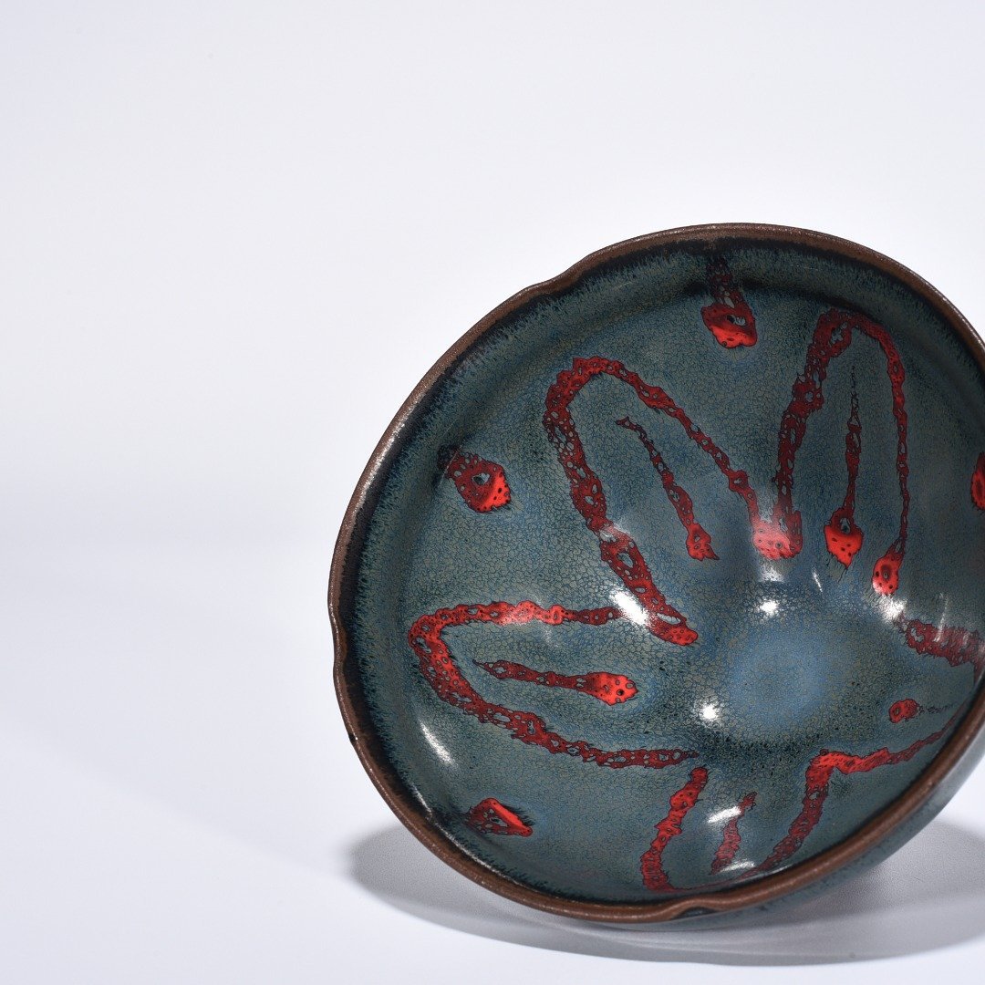 Song Dynasty Jianyao blue glaze spotted flower mouth lamp
