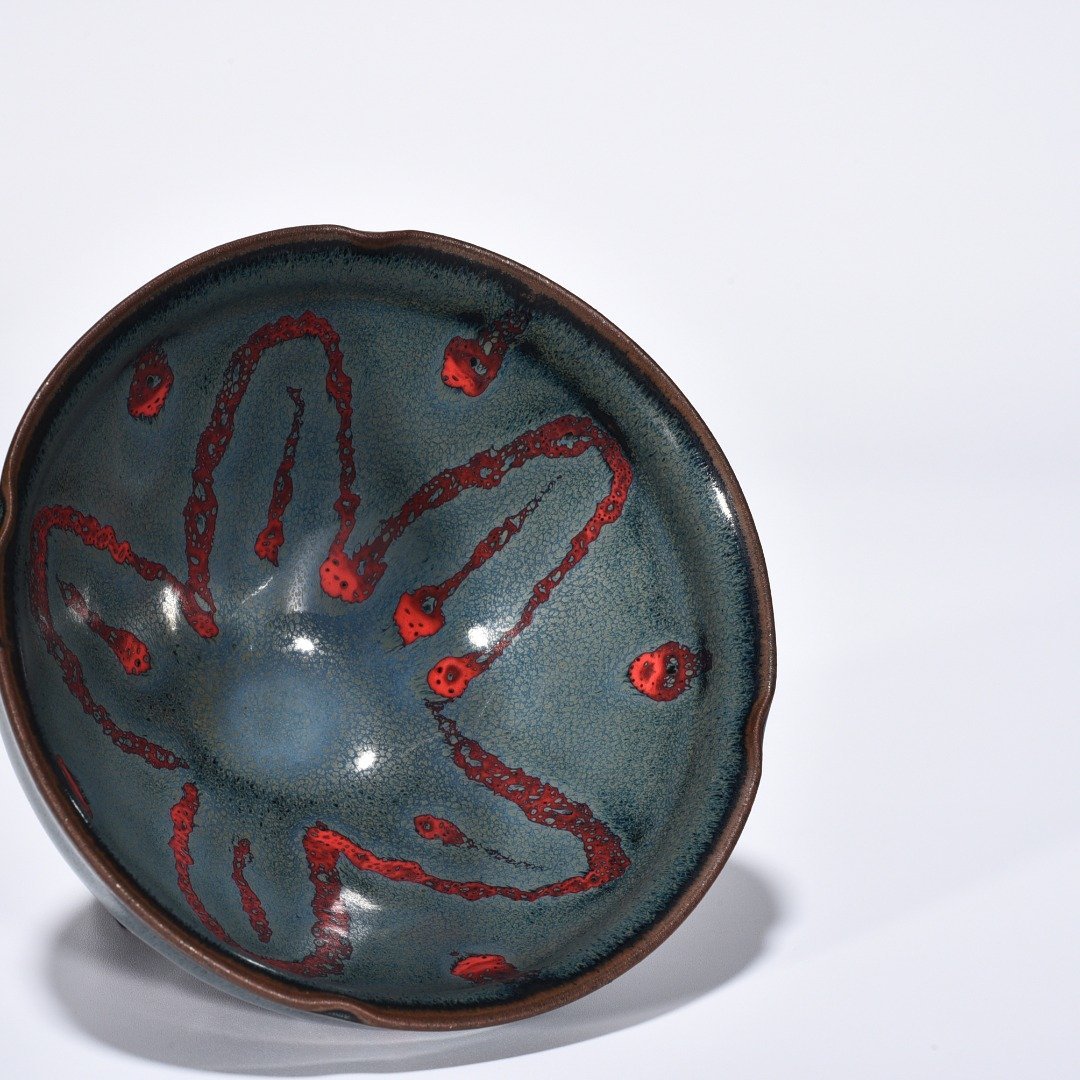 Song Dynasty Jianyao blue glaze spotted flower mouth lamp