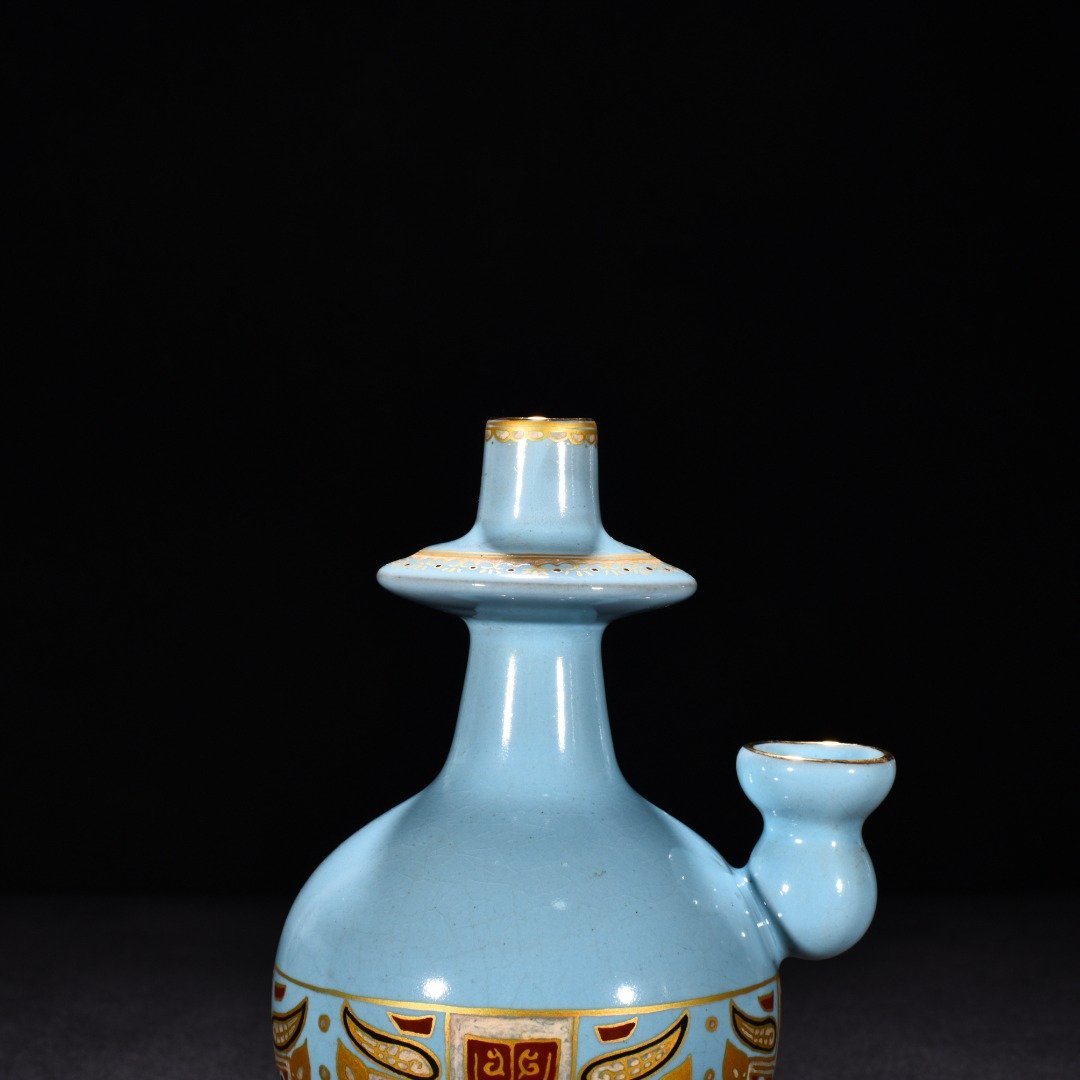 Song Dynasty Ru kilna sky-blue glaze with gold painted Taotie beast face pattern Pot