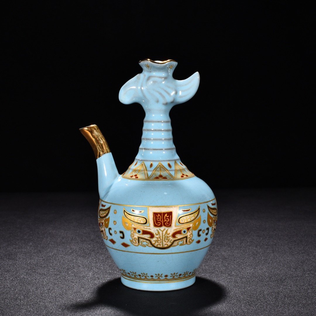 Song Dynasty Ru Kiln sky blue glaze gilded gluttonous animal face pattern eagle head pot