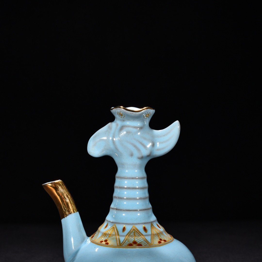 Song Dynasty Ru Kiln sky blue glaze gilded gluttonous animal face pattern eagle head pot