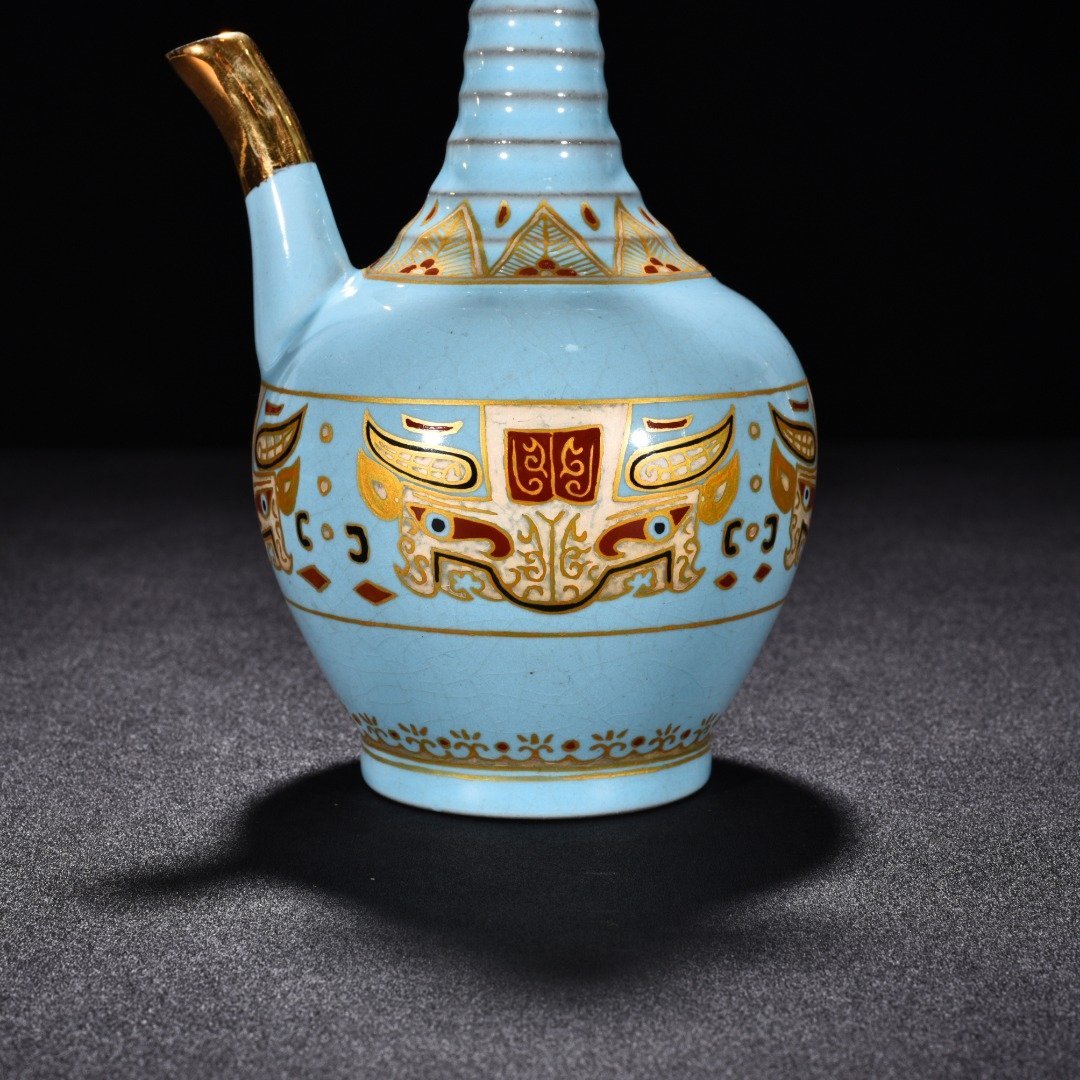Song Dynasty Ru Kiln sky blue glaze gilded gluttonous animal face pattern eagle head pot